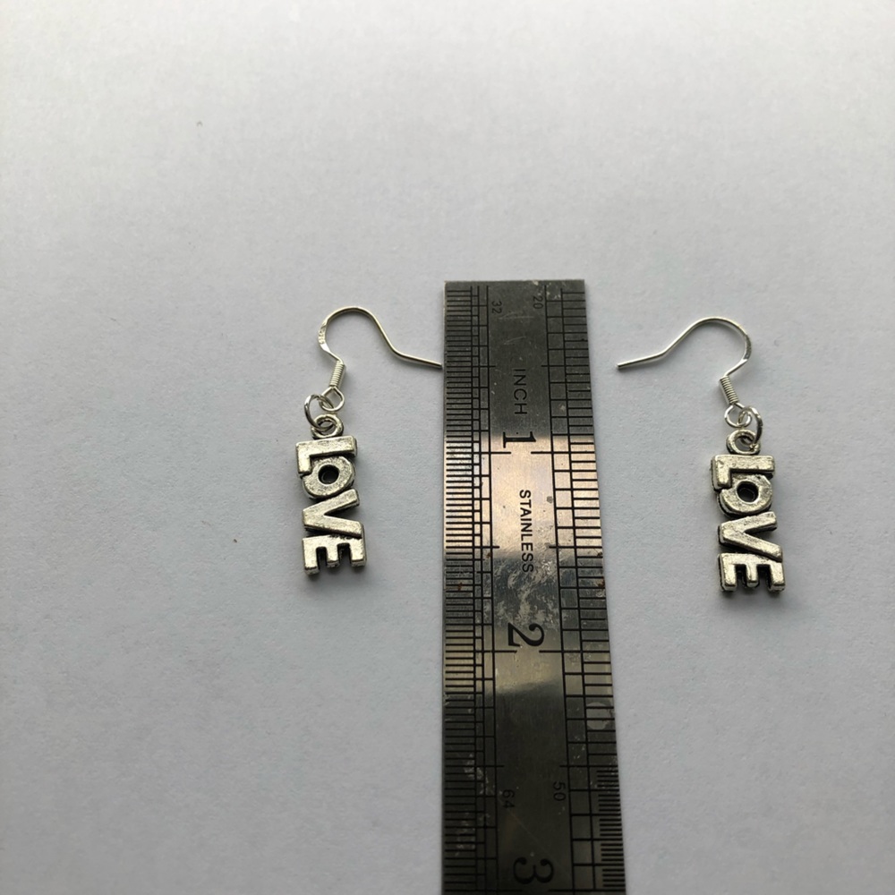 Lovely Sterling, silver love dangling earrings